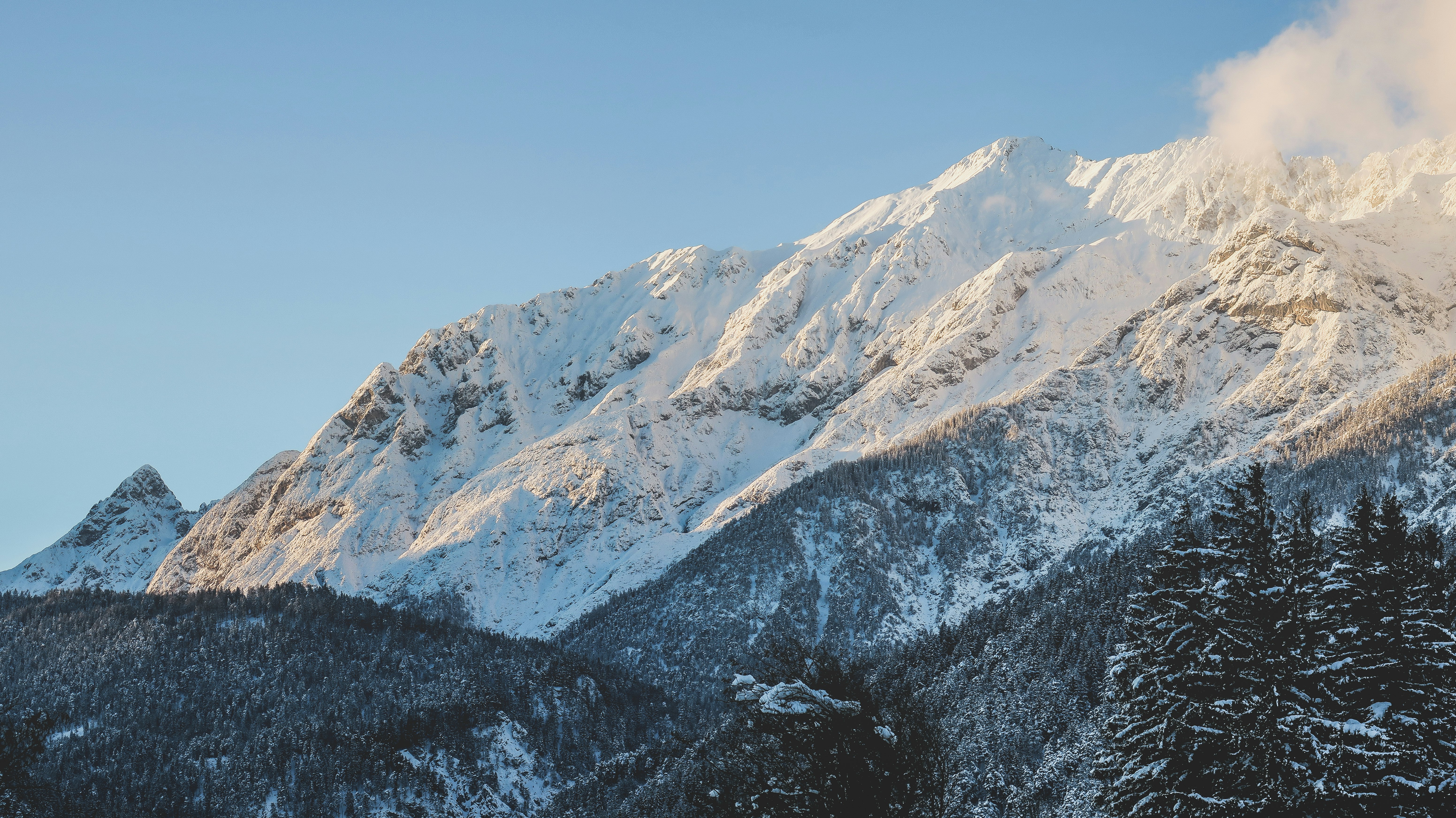 snow-capped mountain under clear sky